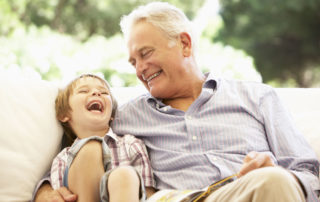 elderly man spending time with grandson